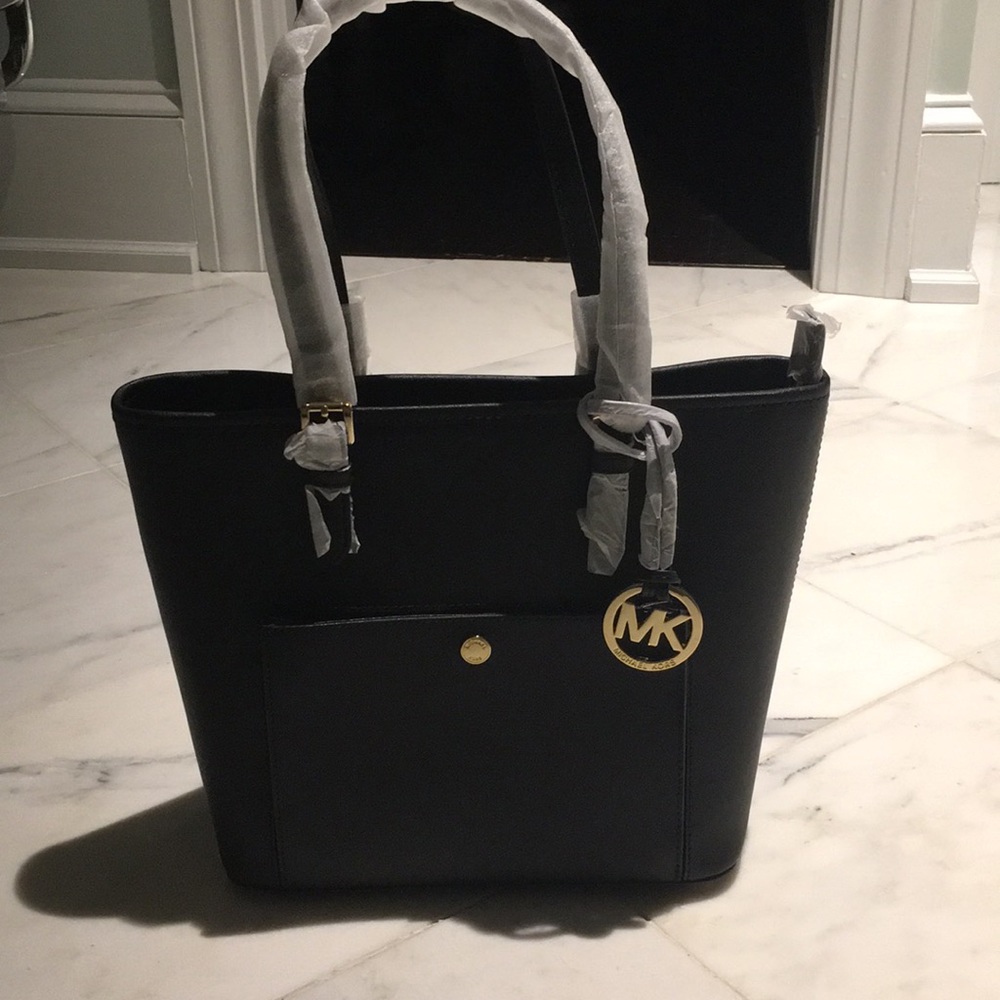 Brand new with tags Michael Kors snap pocket tote